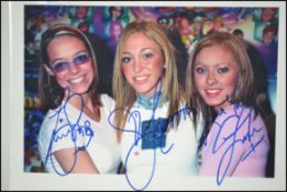 Atomic Kitten autographs.