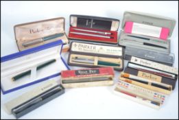 A collection of collectable cased Fountain pens and ball point pens too include a 14k nib Mabbie