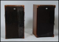 A pair of 1970's teak wood Sony 7100 series speakers.