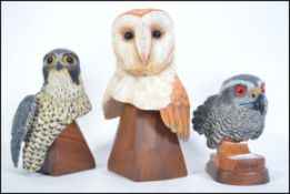 A collection of 3 impressive hand carved and crafted animal wooden figurines / studies to include a