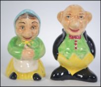 A pair of Sylvac character condiments - Salt & Pepper pots in the form of a lady and gentleman