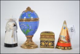 Two Royal Worcester candle snuffers to include Swallows at dusk commemorating the 250th anniversary