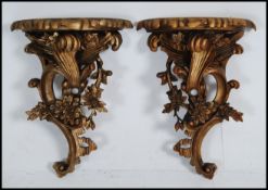 2 large 20th century gilt resin rococo clock - wall brackets.