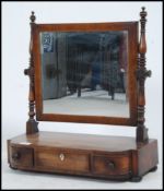 An 19th century mahogany swing dressing table mirror,