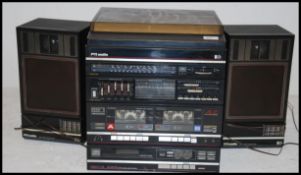 A retro 1980's Pye Stereo hi-fi system complete with the matching speakers