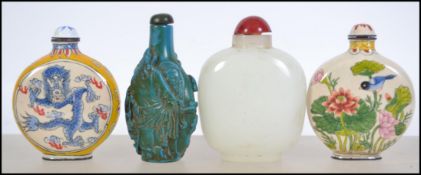 Four 20th century Chinese scent bottles.