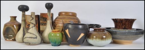 A collection of studio pottery of various shapes and designs from various potters with marks such