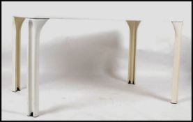 A 1970's retro Italian dining table in white by Vico Magistretti.