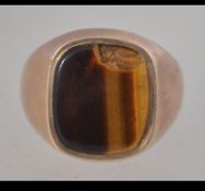 A hallmarked 9ct gold signet ring set wi