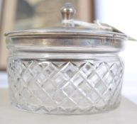 A silver hallmarked ladies rouge / powder pot having cut glass bowl.