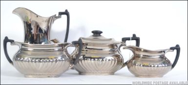 A Three Piece ` Victorian Silver Ware `