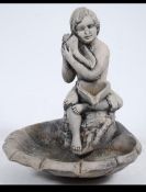 A well weathered reconstituted stone gar