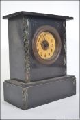 A Victorian slate and marble mantel cloc