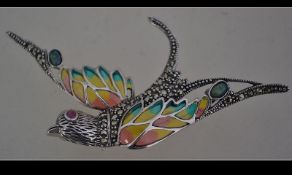 A silver plique a jour brooch in the for