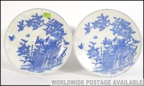 A pair of Chinese blue and white wall ch