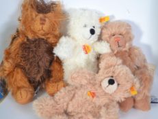 A collection of Franklin mint glass dome