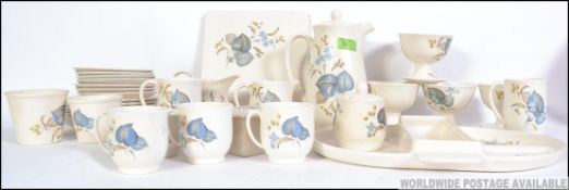 A retro chintzy part tea service by Sylv