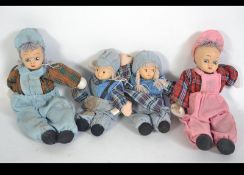Doll family with hand painted bisque fac