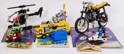 VINTAGE LEGO: A collection of various loose made vintage Lego sets.
