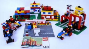 1970's LEGO: A collection of vintage 1970's loose Lego sets - all made into various models (some
