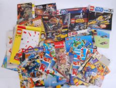 LEGO MANUALS: A large collection of assorted Lego manuals / instructions - various themes and
