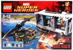LEGO SUPER HEROES: A Lego Marvel Super Heroes set 76007 Iron Man Malibu Mansion Attack set.