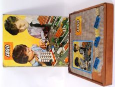 LEGO SYSTEM: An early vintage Lego System cased set of building bricks etc.