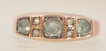 A Victorian hallmarked 15ct gold ring set with seed pearl and peridot. Hallmarked Birmingham.
