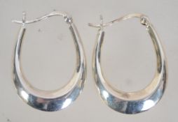 A pair of 925 silver hoop earrings with lever post backs. Measures approx 1.5 inches. Marked 925.