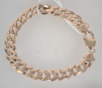 A hallmarked 9ct gold belcher diamond cut kerb linked bracelet with lobster clasp.