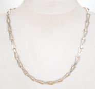 A hallmarked 925 silver designer V link chain necklace. Hallmarked for London import. Weight 40.7g.