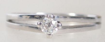 A 14ct white gold single stone ladies diamond ring.