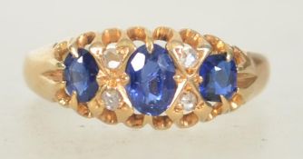 An Edwardian hallmarked 18ct gold sapphire and diamond ring,