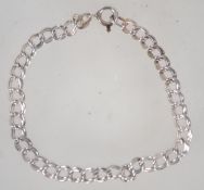 A 925 silver twin link bracelet with spring hoop clasp. Marked 925 italy. Measures approx 7 inches.