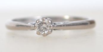 A hallmarked 18ct white gold diamond ring having single solitaire diamond approx 10pnts being claw