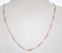 A vintage ladies 9ct gold fancy link necklace with barrel clip clasp. Length 42cms / weight 4.2g.