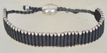 A hallmarked 925 silver Links of London cord friendship bracelet. Hallmarked Edinburgh.