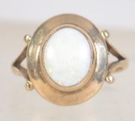 A hallmarked 9ct gold and opal ring. Hallmarked for London 1977. Size O.5.