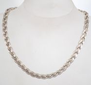A hallmarked 925 silver designer wreath link chain necklace. Hallmarked for London. Weight 69.4g.