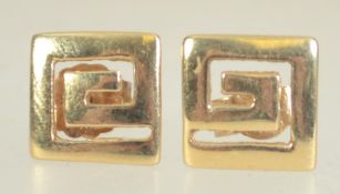 A pair of 9ct gold stud earrings in the shape of greek key with post backs. Test 9ct gold.