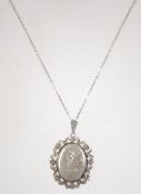 A hallmarked 925 silver locket pendant necklace. Measures chain 18 inches, Locket approx 1.