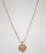 A hallmarked 9ct gold Figaro chain linked necklace with heart locket pendant inscribed ' Love You