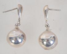 A pair of 925 silver drop earrings with post backs. Measures 1.5 inches.