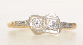 An 18ct gold, platinum and diamond vintage ladies ring. The stones approx 10pnts. Size K.