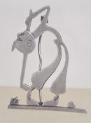 An Art Deco golfer brooch with initials to back B. I.