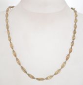 A hallmarked 925 silver designer spiral chain necklace. Hallmarked for London import. Weight 15.1g.