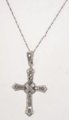 A 925 silver and marcasite pendant necklace. The pendant in the form of a crucifix.
