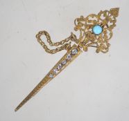 A 1920s gilt brass Czech filigree and rhinestone jabot pin. Measures 7.