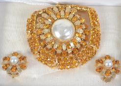 A vintage Sphinx rhinestone and pearl set bracelet, earring and brooch suite. Signed Sphinx. boxed.