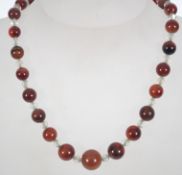 A vintage agate, carnelian and crystal bead necklace with spring hoop clasp.